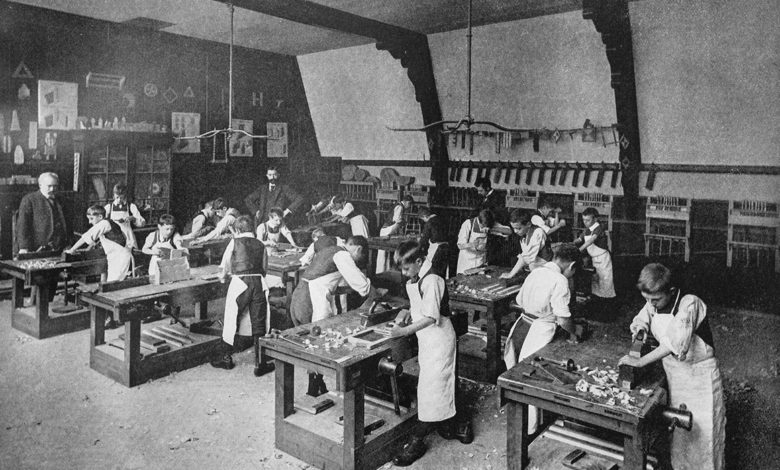 All-male vocational shop class typical of the early twentieth century.