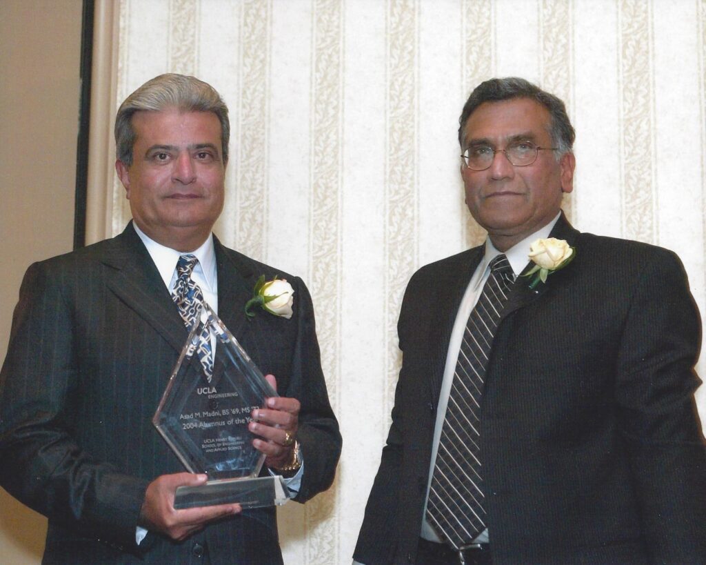 Receiving UCLA Alumnus of the Year Award from Dean Vijay Dhir